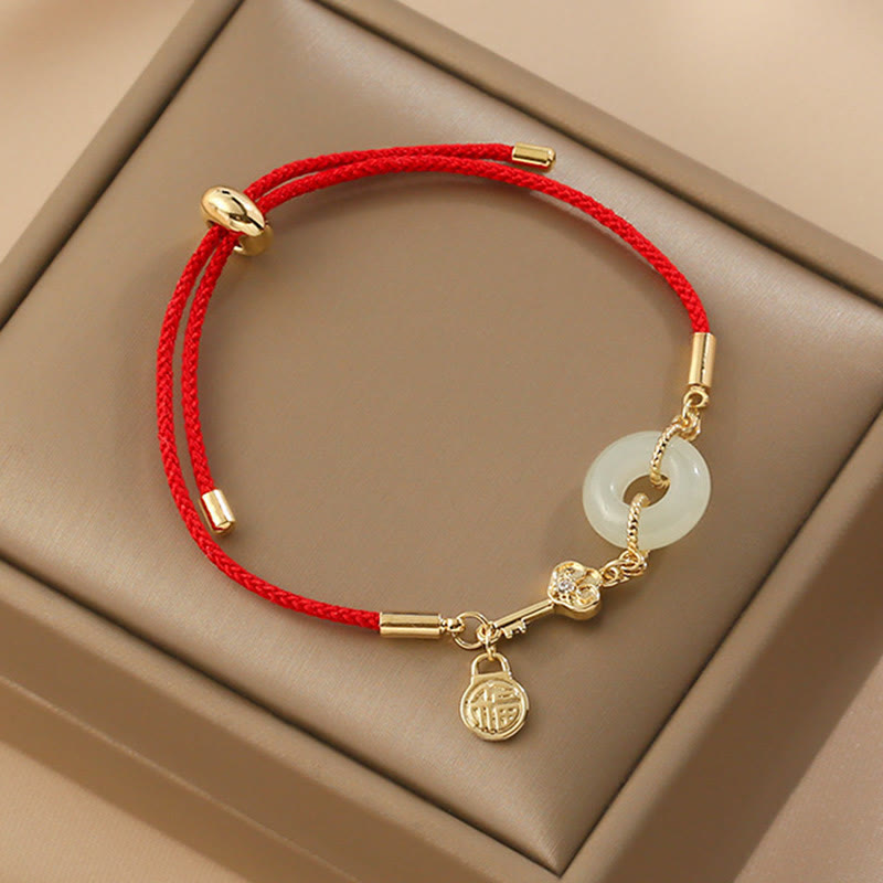 Fortune Jewel 18K Gold Plated Hetian Jade Peace Buckle Fu Character Luck Red Rope Bracelet