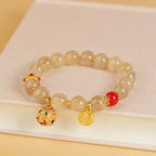 Fortune Jewel Natural Golden Rutilated Quartz Fu Character Charm Bell Wealth Bracelet