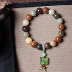 Fortune Jewel Natural Multicolored Gradient Bodhi Seed Liuli Glass Charm Peace Bracelet