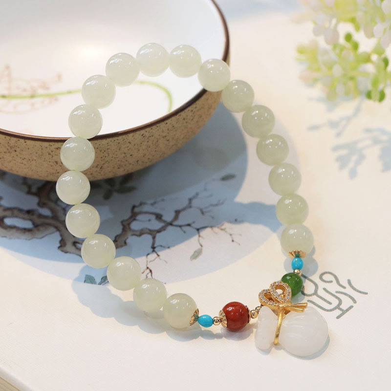 Fortune Jewel Natural Hetian White Jade 14K Gold Plated Money Bag Blessing Bracelet