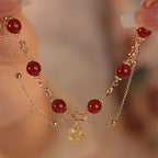 Fortune Jewel 14k Gold Plated Red Agate Star Flower Charm Calm Bracelet