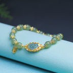 Fortune Jewel 925 Sterling Silver Plated 14K Gold Hetian Jade Lotus Luck Bracelet