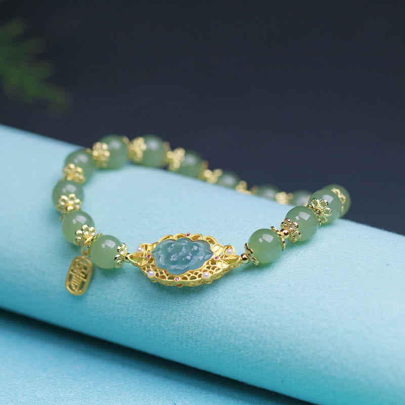 Fortune Jewel 925 Sterling Silver Plated 14K Gold Hetian Jade Lotus Luck Bracelet