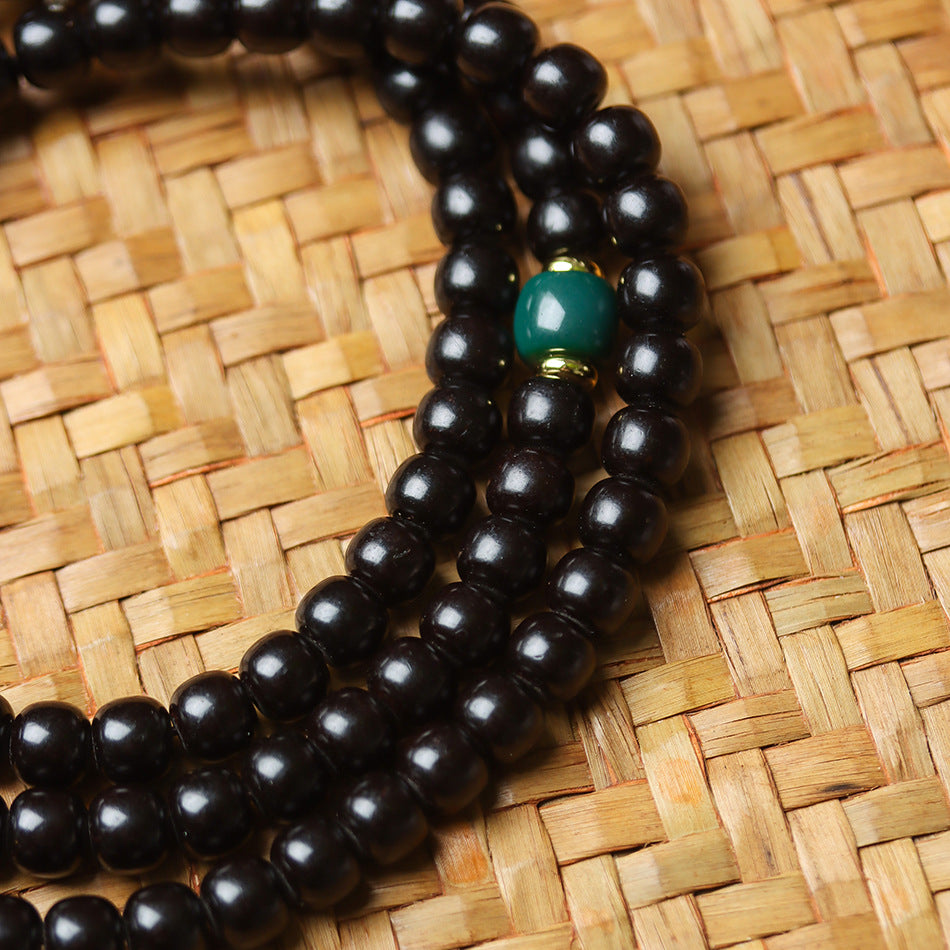 108 Mala Beads Bracelet in Natural Indonesian Black Gold Coconut Crown with Tibetan Silver Guru Bead