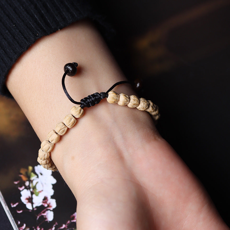 Tibetan-Style Direct-Cut Cypress Seed Braided Bracelet with Carved Bodhi Lotus Bead