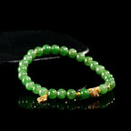 Women’s Handcrafted Aged Green Hetian Jade Bracelet with Golden Charms