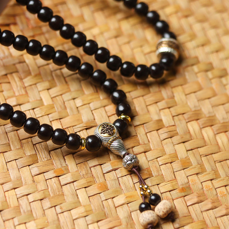 108 Mala Beads Bracelet in Natural Indonesian Black Gold Coconut Crown with Tibetan Silver Guru Bead