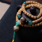 Cypress Seed 108 Mala Beads Bracelet with Straight-Cut Ghost Face – Handcrafted in Tibet