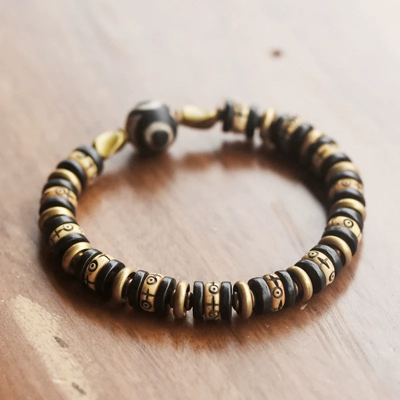 Tibetan-Style Hand-Carved Bone Bead Bracelet with Ebony and Brass Spacers, and Agate Dzi