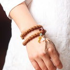 Double Wrap Rudraksha Bracelet with Sandalwood Ring and Gold Ruyi Charm