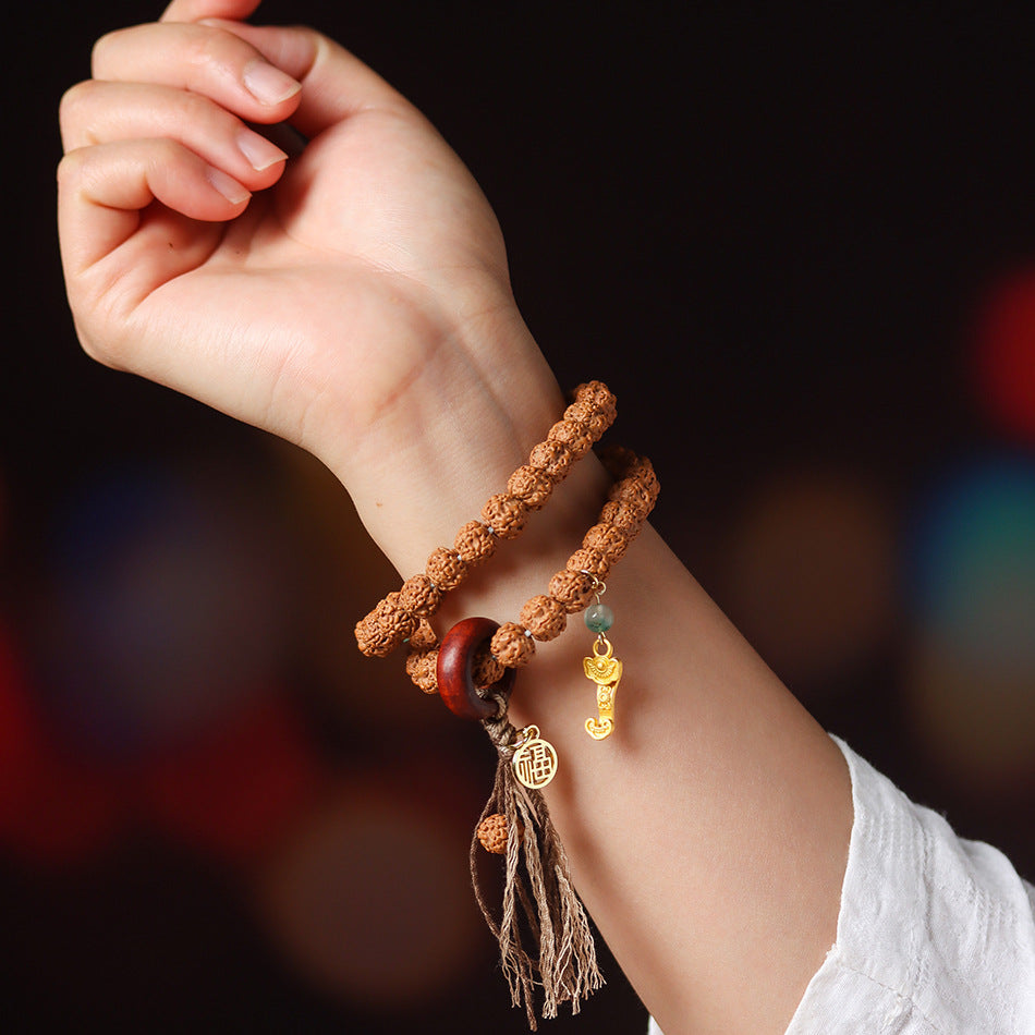 Double Wrap Rudraksha Bracelet with Sandalwood Ring and Gold Ruyi Charm