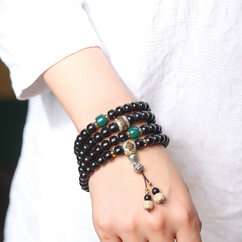 108 Mala Beads Bracelet in Natural Indonesian Black Gold Coconut Crown with Tibetan Silver Guru Bead