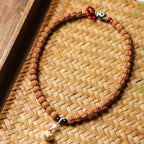 Original Form Small Rudraksha Double Wrap Bodhi Bracelet with Boxwood Carved Lotus Pendant