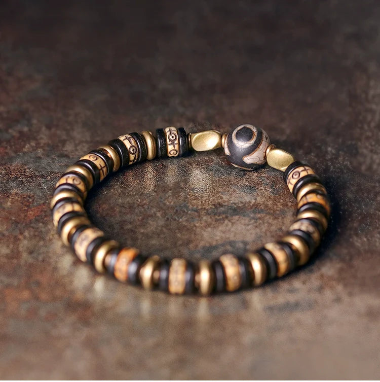 Tibetan-Style Hand-Carved Bone Bead Bracelet with Ebony and Brass Spacers, and Agate Dzi