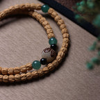 Cypress Seed 108 Mala Beads Bracelet with Straight-Cut Ghost Face – Handcrafted in Tibet