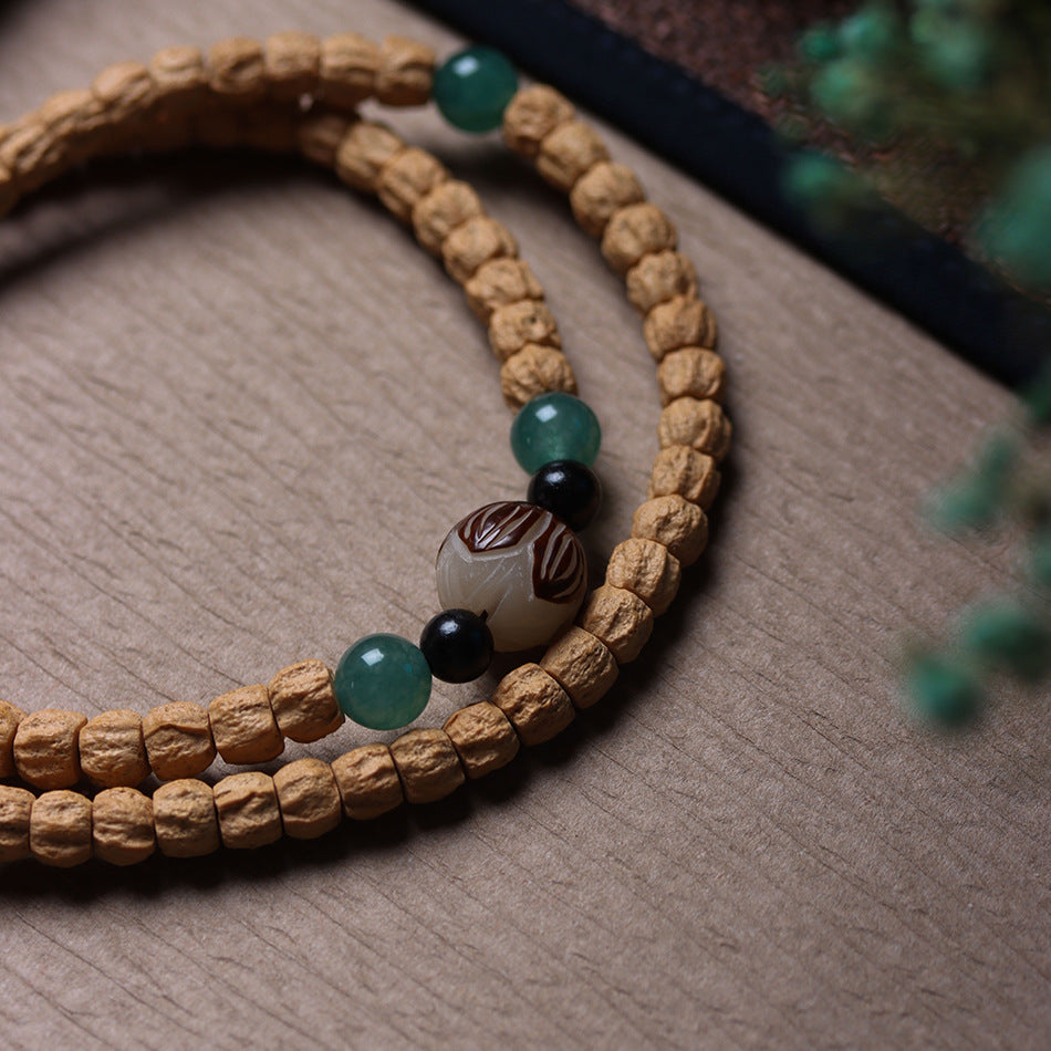 Cypress Seed 108 Mala Beads Bracelet with Straight-Cut Ghost Face – Handcrafted in Tibet