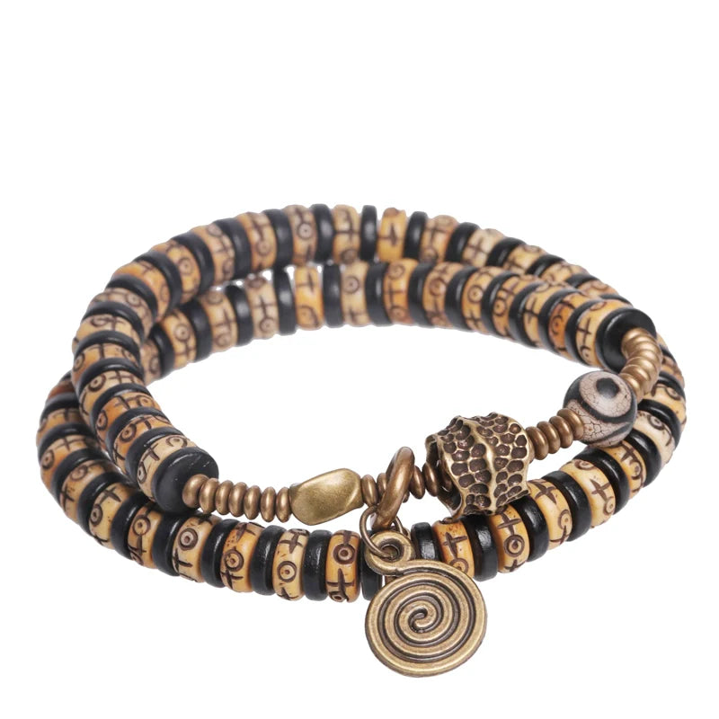 Double-Wrap Tibetan-Style Hand-Carved Bone Bead Bracelet with Ebony Spacers, Brass Accents, and Agate Dzi Charm
