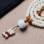 108 Mala Beads White Jade Bodhi Bracelet with Carved Lotus Pendant and Olive Pit Spacers