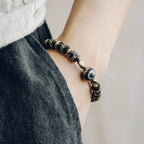 Tibetan-Style Hand-Carved Bone Bead Bracelet with Ebony and Brass Spacers, and Agate Dzi