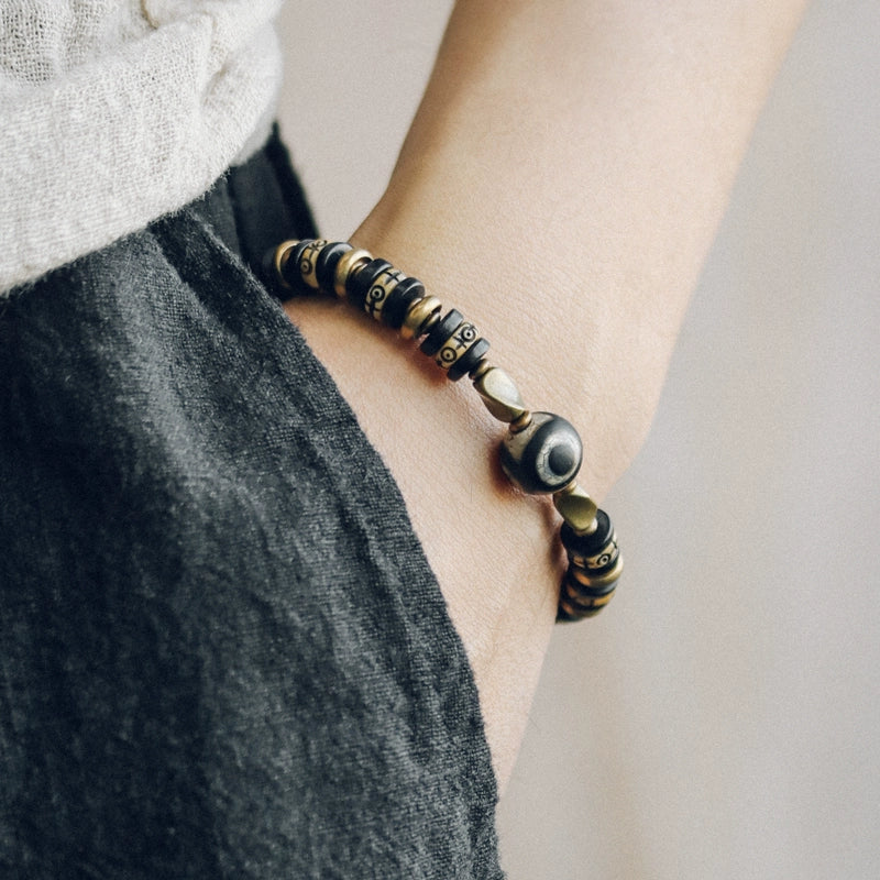 Tibetan-Style Hand-Carved Bone Bead Bracelet with Ebony and Brass Spacers, and Agate Dzi
