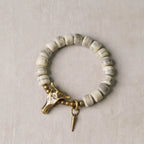 Tibetan Handmade Yak Bone & Brass Bull Head Bracelet · Strength and Spirit
