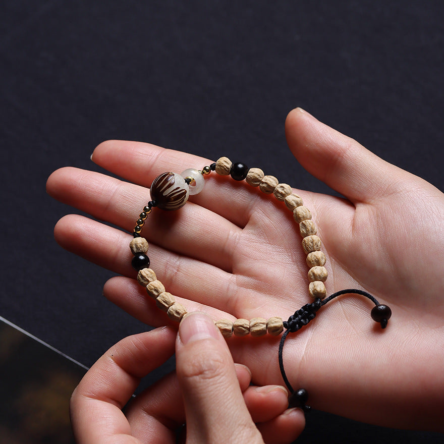 Tibetan-Style Direct-Cut Cypress Seed Braided Bracelet with Carved Bodhi Lotus Bead
