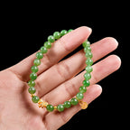Women’s Handcrafted Aged Green Hetian Jade Bracelet with Golden Charms