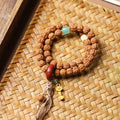 Double Wrap Rudraksha Bracelet with Sandalwood Ring and Gold Ruyi Charm