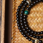 108 Mala Beads Bracelet in Natural Indonesian Black Gold Coconut Crown with Tibetan Silver Guru Bead