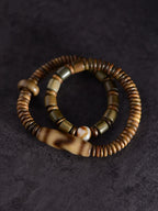 Tiger Tooth Dzi Tibetan Sandalwood Bracelet