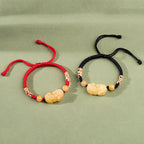 Natural Golden Silk Jade Pi Xiu Bracelet – Handwoven Peach Blossom Knot, Unisex Feng Shui Jewelry