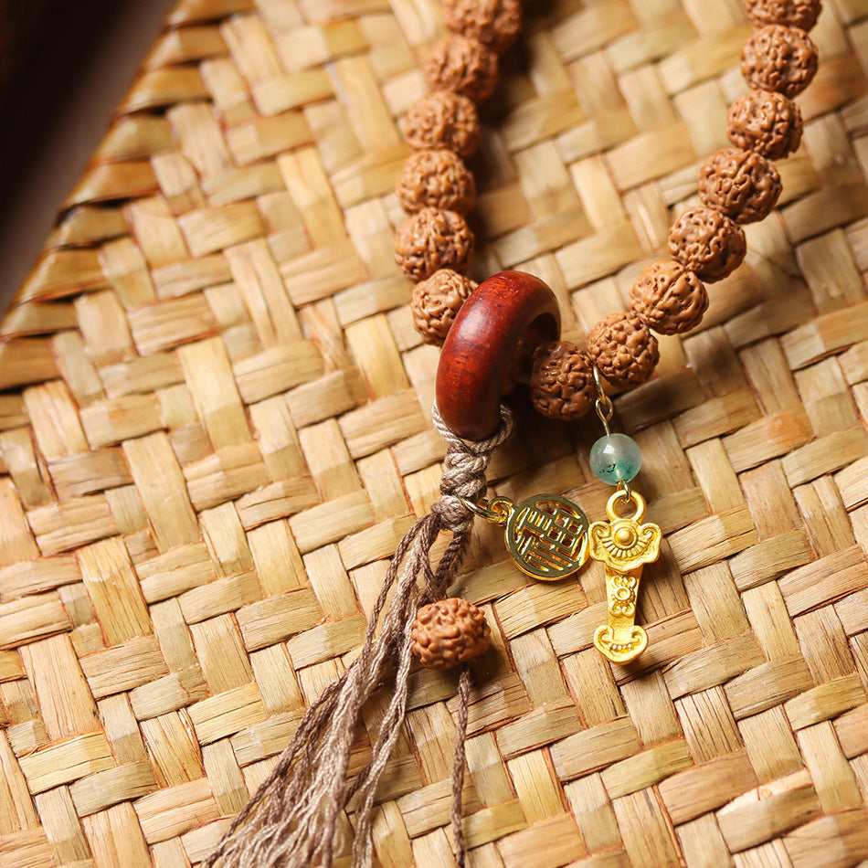 Double Wrap Rudraksha Bracelet with Sandalwood Ring and Gold Ruyi Charm
