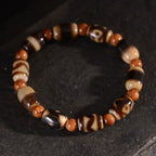 Agate Dzi Bead Bracelet with Cook Round Beads