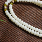 White Jade Bodhi 108 Mala Beads Bracelet with Carved Lotus Slice Pendant