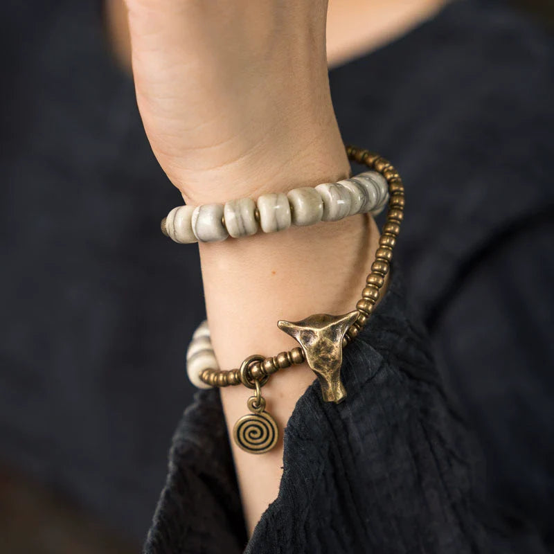 Men’s Bracelet with Natural Yak Bone Beads and Brass Bull Head Accent