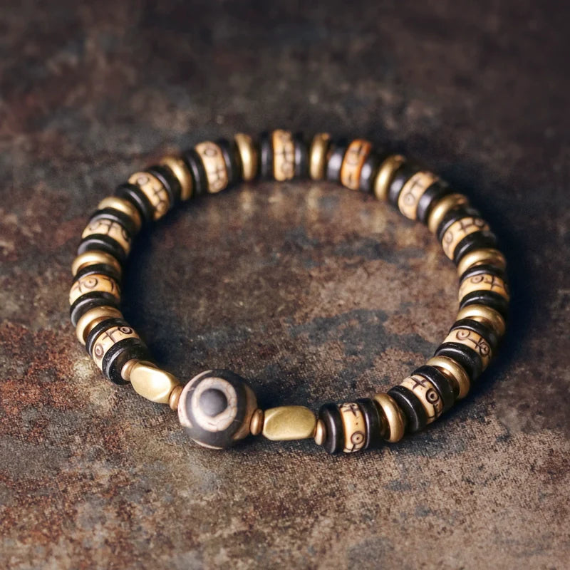 Tibetan-Style Hand-Carved Bone Bead Bracelet with Ebony and Brass Spacers, and Agate Dzi