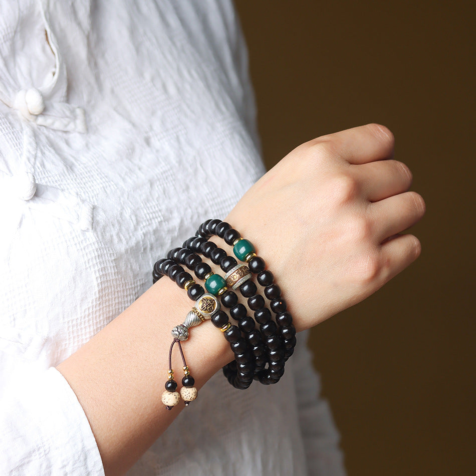 108 Mala Beads Bracelet in Natural Indonesian Black Gold Coconut Crown with Tibetan Silver Guru Bead