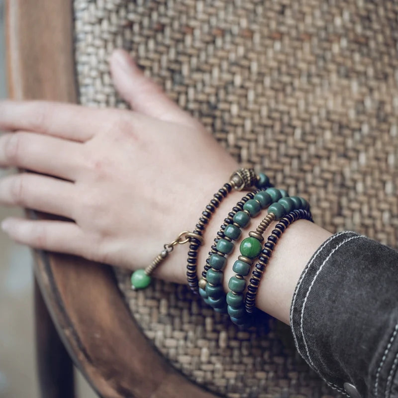 Green Bodhi Beads Bracelet with Ebony & Brass Spacers · Multi-Layer Spiritual Mala for Meditation & Mindfulness