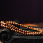 Premium Tibetan Buddha Hand Rudraksha Bodhi 108 Mala – Unisex Bracelet