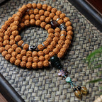 Dragon Vein Exploding Texture Rudraksha 108 Mala Beads Bracelet with Alxa Agate Accents
