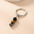 Exclusive: Buddha & Karma Triple Protection Crystal Keychain – Protection On the Go