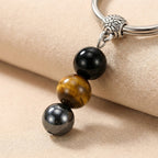 Exclusive: Buddha & Karma Triple Protection Crystal Keychain – Protection On the Go
