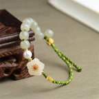 Fortune Jewel 925 Sterling Silver Natural Hetian Jade Peach Blossom Luck Bracelet