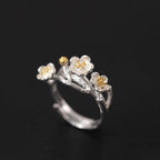 Fortune Jewel 925 Sterling Silver Plum Blossom Floral Blessing Earrings
