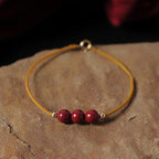 Fortune Jewel 14K Gold Plated Natural Cinnabar Blessing String Braided Bracelet