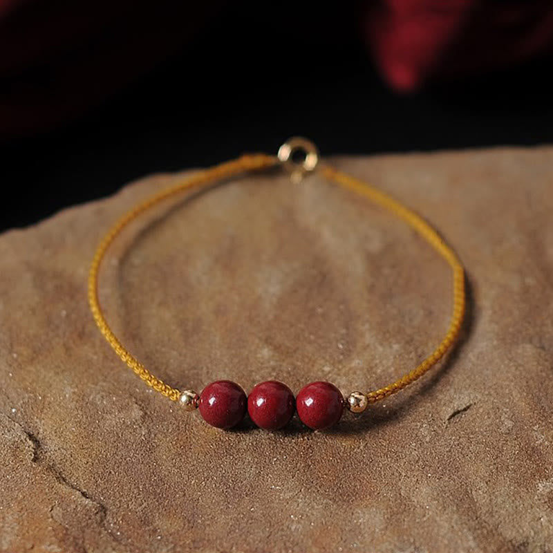Fortune Jewel 14K Gold Plated Natural Cinnabar Blessing String Braided Bracelet