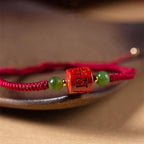 Fortune Jewel Tibetan Cinnabar Om Mani Padme Hum Engraved Blessing Braided Rope Bracelet
