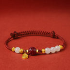 Fortune Jewel 24K Gold Plated Hetian White Jade Cinnabar Lotus Luck Rope Bracelet