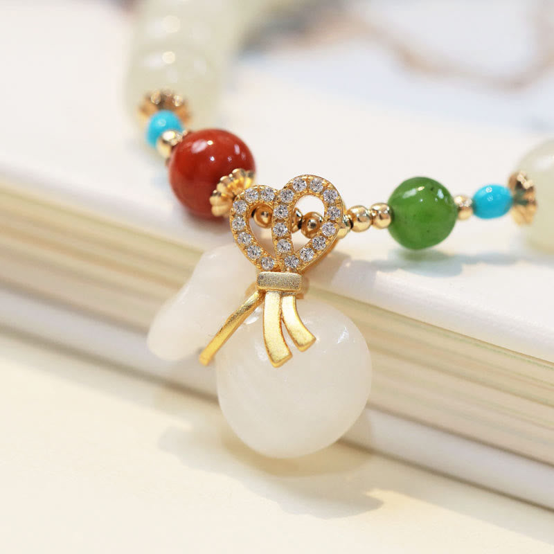 Fortune Jewel Natural Hetian White Jade 14K Gold Plated Money Bag Blessing Bracelet