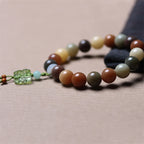 Fortune Jewel Natural Multicolored Gradient Bodhi Seed Liuli Glass Charm Peace Bracelet